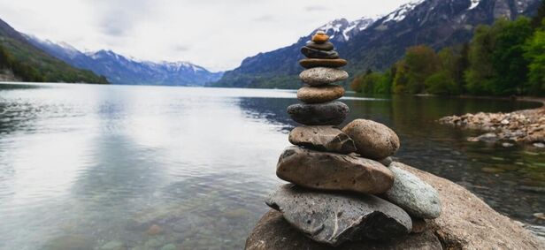 A tranquil cairn making the way to pain relief